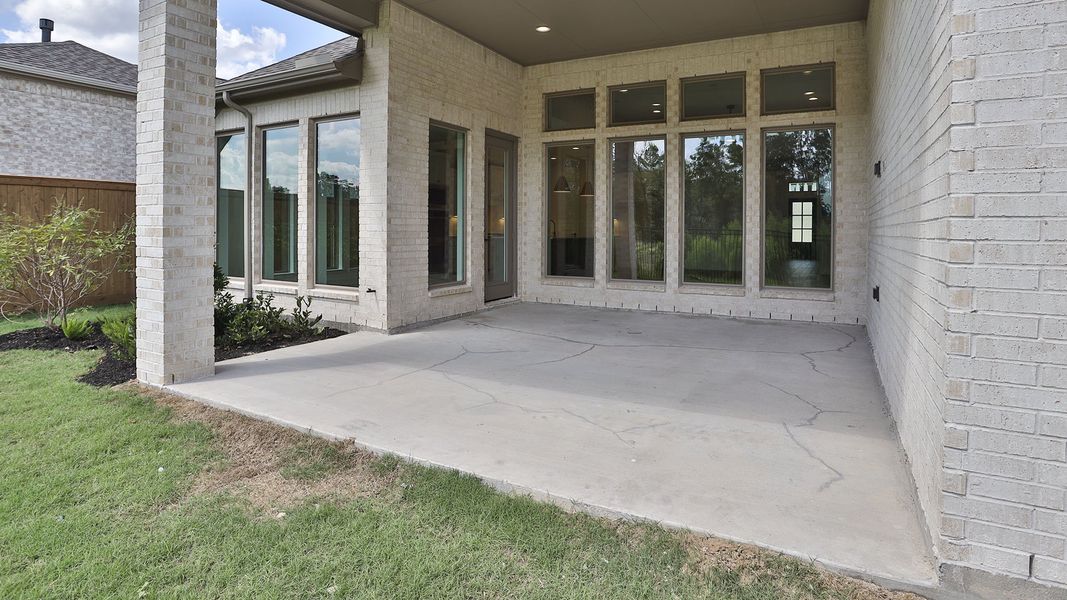 Exterior details and patio area of a home in The Highlands, Porter (Image 4). Exterior details and patio area of a home in The Highlands, Porter (Image 4).