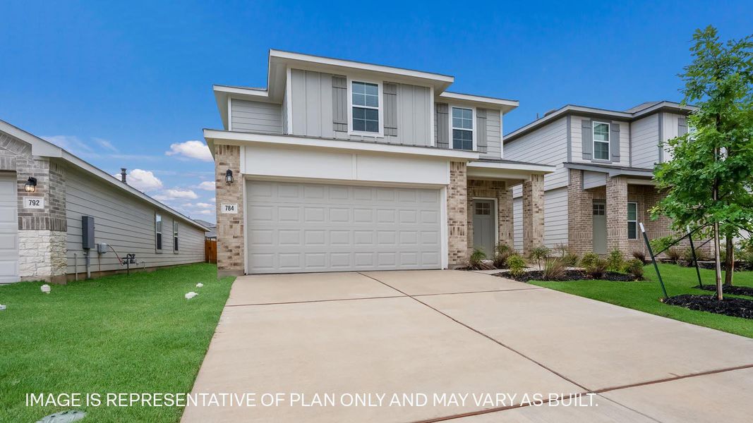 Front exterior of a new home in Prairie Lakes, Buda, TX, highlighting curb appeal (Image 2). Front exterior of a new home in Prairie Lakes, Buda, TX, highlighting curb appeal (Image 2).