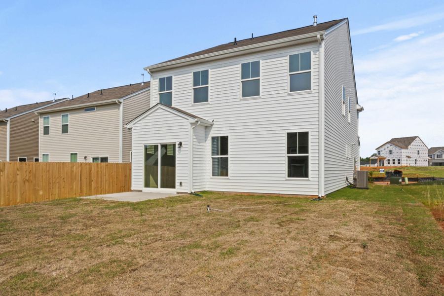 Front exterior of a new home in Harrington, Greenville, SC, highlighting curb appeal (Image 17). Front exterior of a new home in Harrington, Greenville, SC, highlighting curb appeal (Image 17).