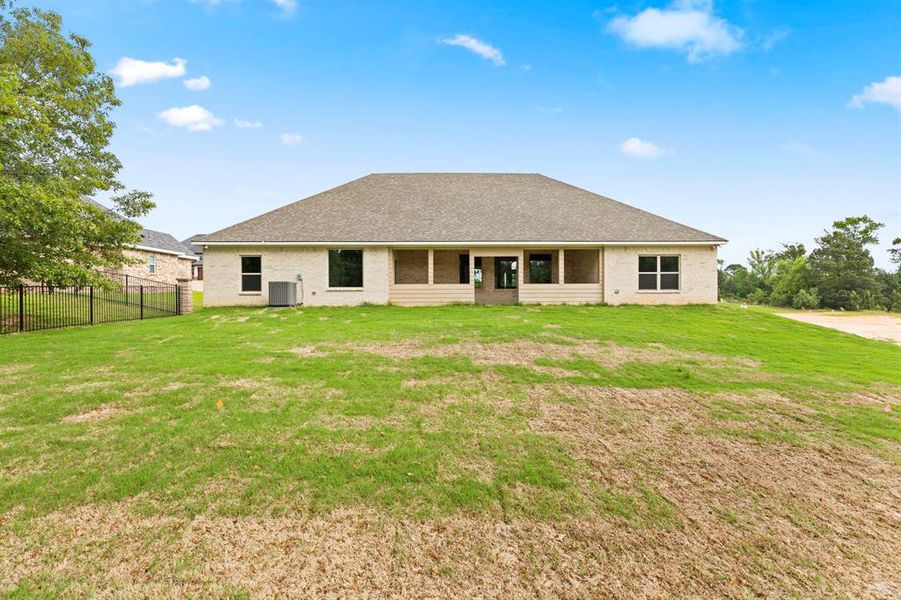 Exterior details and patio area of a home in , Lindale (Image 3).