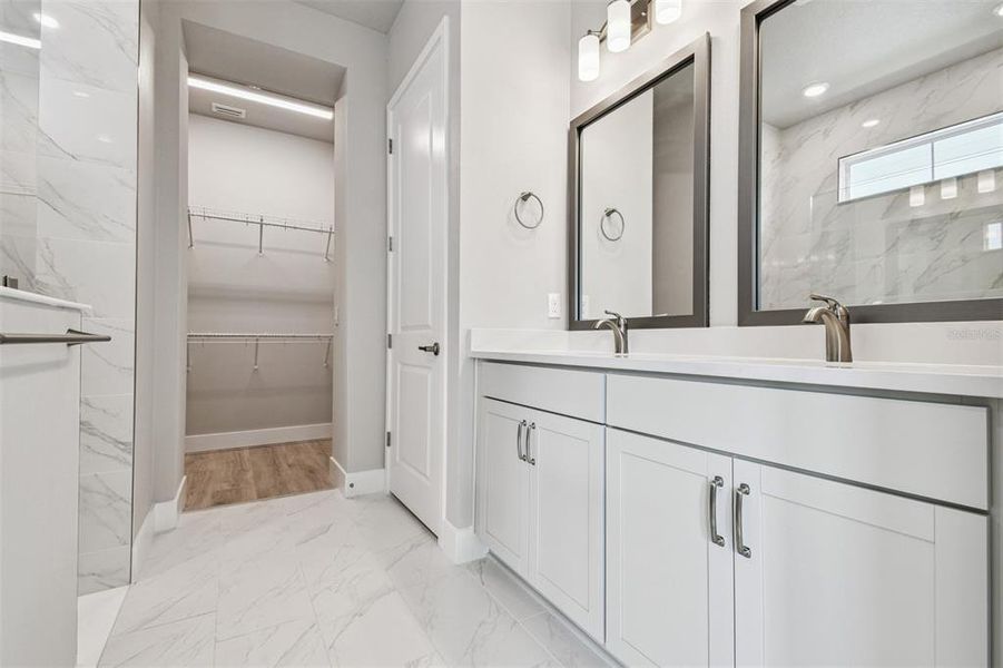 Furnished interior view inside a new home in Emerald Landing at Waterside at Lakewood Ranch – Cottage Series, Sarasota (Image 16). Furnished interior view inside a new home in Emerald Landing at Waterside at Lakewood Ranch – Cottage Series, Sarasota (Image 16).