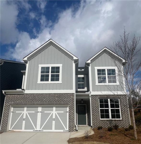 Front exterior of a new home in Lakeside at Great Sky, Canton, GA, highlighting curb appeal (Image 1).
