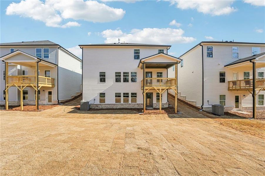 Exterior details and patio area of a home in Westmont Preserve, Powder Springs (Image 31).