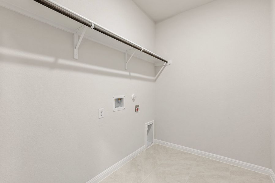Representative unfurnished interior of a home built from the Somerville by Ashton Woods in Willow Springs, Buda (Image 18).