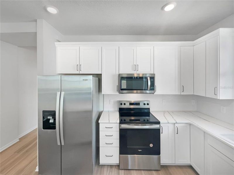 Furnished interior view inside a new home in , Kissimmee (Image 36).