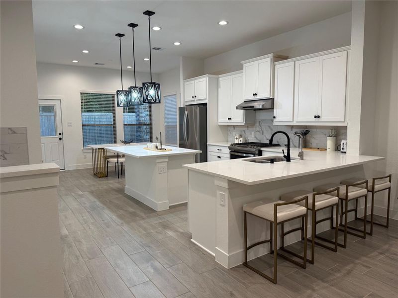 Furnished interior view inside a new home in , Conroe (Image 25).