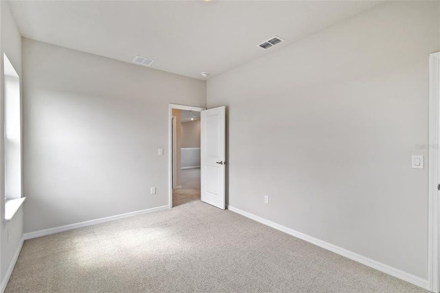 Spacious, unfurnished interior of a new home in Weslyn Park in Sunbridge 34', St. Cloud (Image 23).