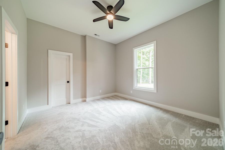 Lower Level Bedroom 4 boast a walk-in closet and faces Lake Norman
