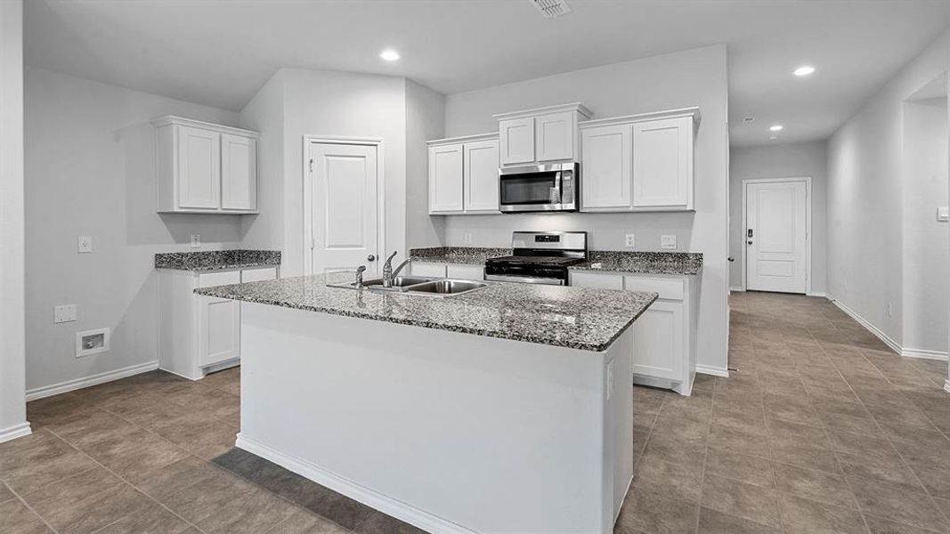 Kitchen - All Home and community information, including pricing, included features, terms, availability and amenities, are subject to change at any time without notice or obligation. All Drawings, pictures, photographs, video, square footages, floor plans, elevations, features, colors and sizes are approximate for illustration purposes only and will vary from the homes as built.