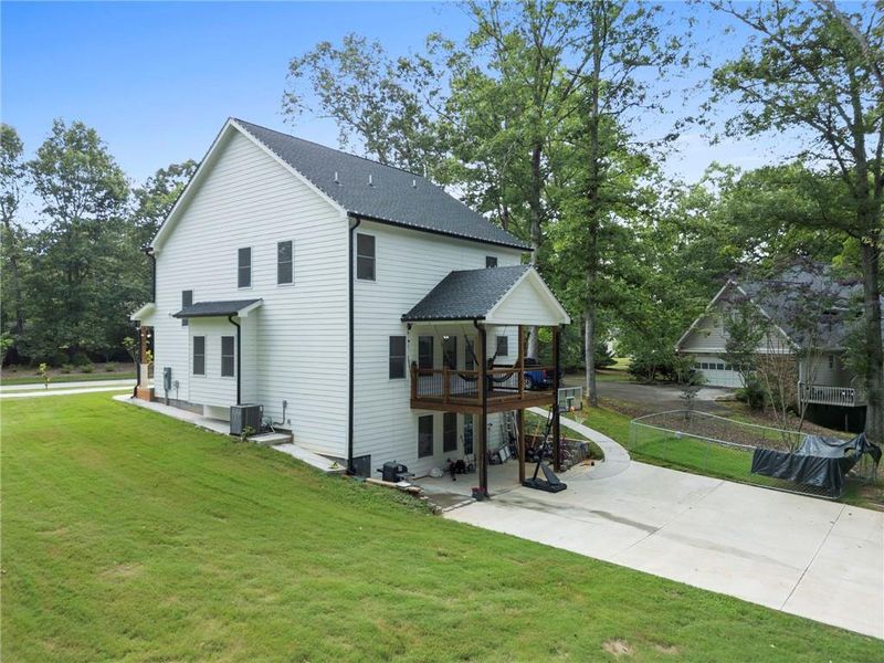 Front exterior of a new home in , Snellville, GA, highlighting curb appeal (Image 25).