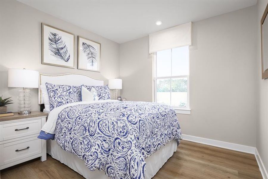 Representative furnished interior of a home built from the Henry by Ryan Homes in Middle Creek Village, Bolivia (Image 8).