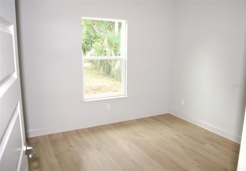 Spacious, unfurnished interior of a new home in , New Smyrna Beach (Image 13).
