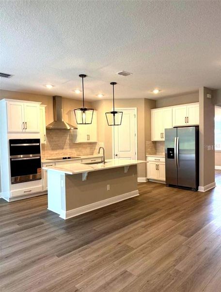 Furnished interior view inside a new home in Legends Preserve - Signature Series, Daytona Beach (Image 5).
