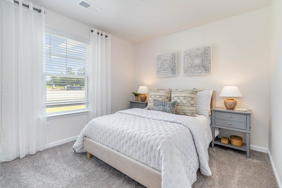 Representative furnished interior of a home built from the HELENA by D.R. Horton in Jordanville Farms, Galivants Ferry (Image 11).