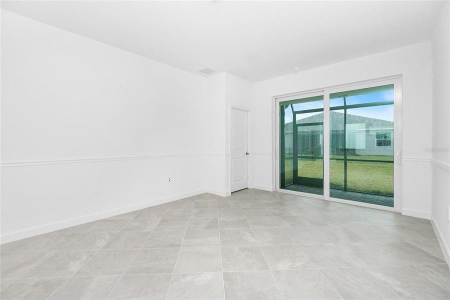 Spacious, unfurnished interior of a new home in Island Lakes at Coco Bay: Villas, Englewood (Image 25).