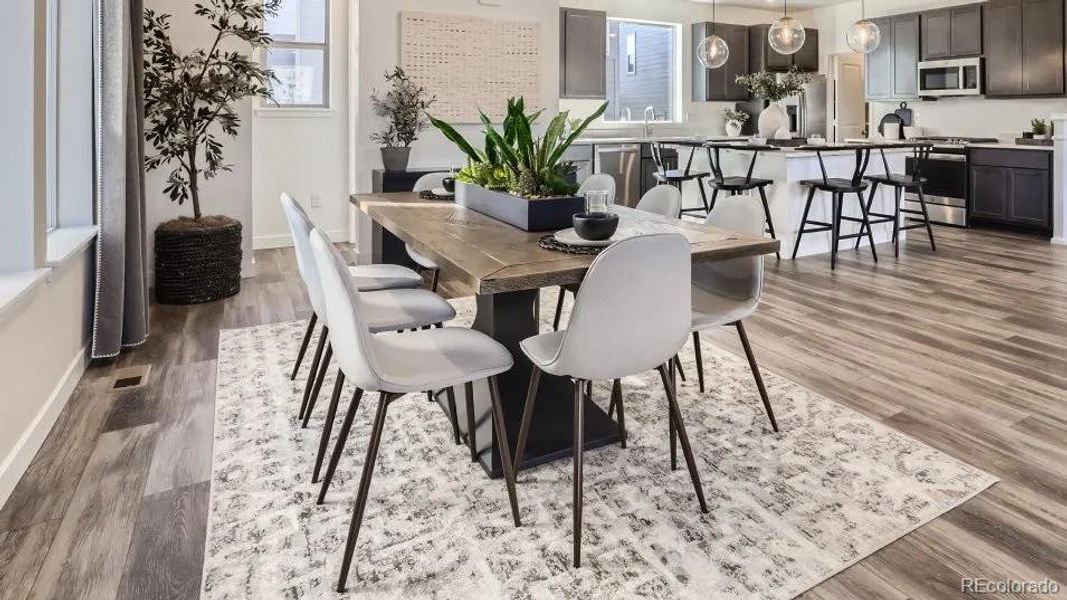 Furnished interior in a model home at Vermilion Creek: The Skyline Collection in Centennial (Image 22).