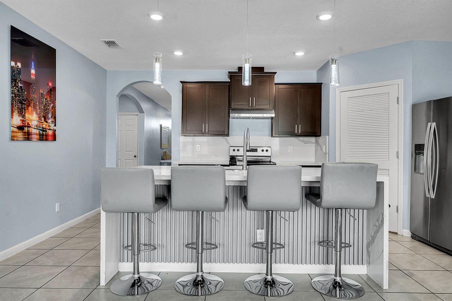 Furnished interior view inside a new home in , Port St. Lucie (Image 13).