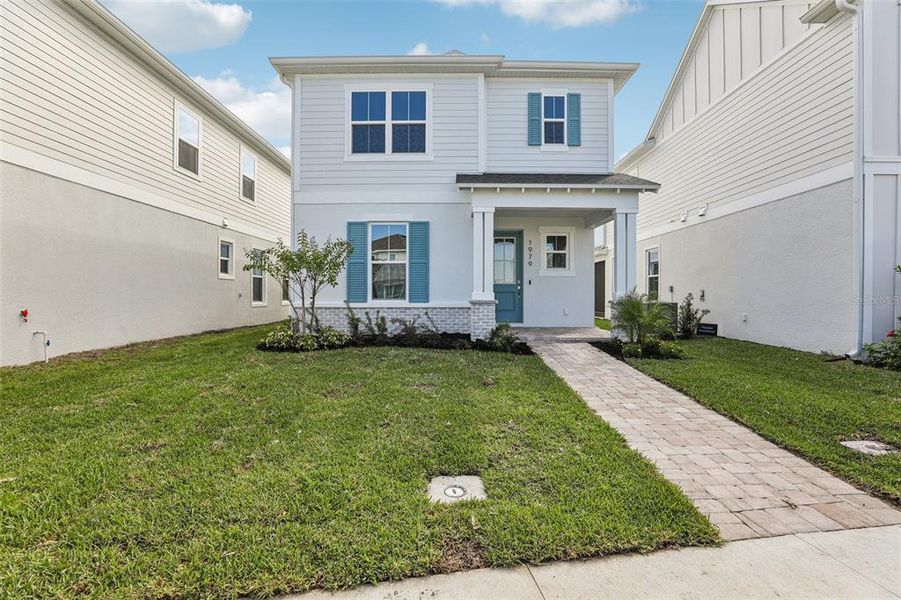 Exterior details and patio area of a home in Trinity Place, St. Cloud (Image 21).