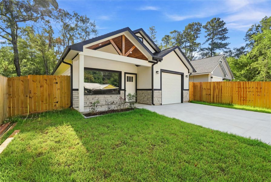 Exterior details and patio area of a home in , Willis (Image 2). Exterior details and patio area of a home in , Willis (Image 2).
