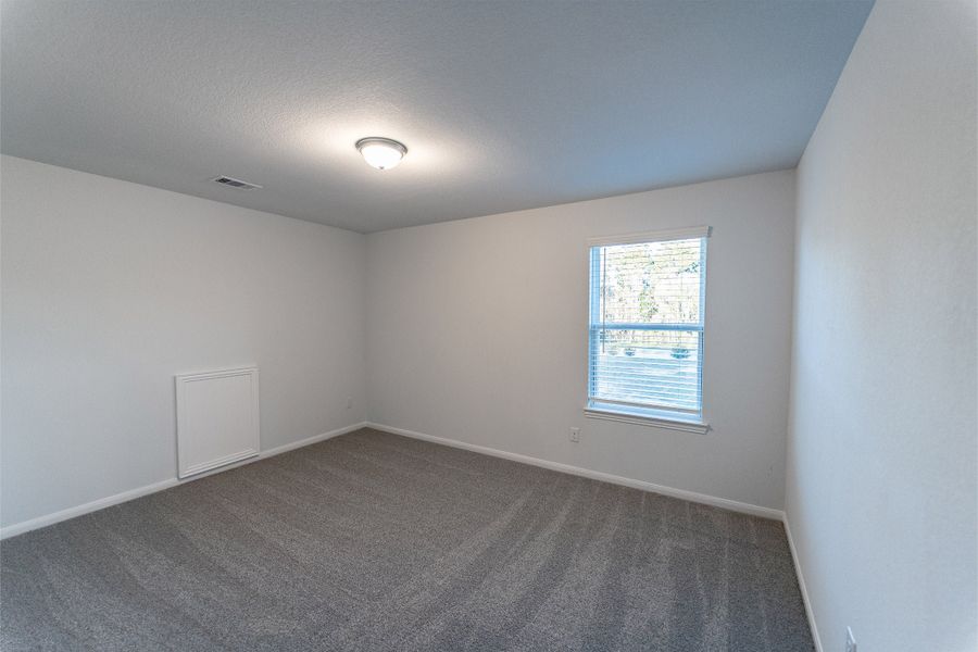 Spacious, unfurnished interior of a new home in Caney Mills, Conroe (Image 45).