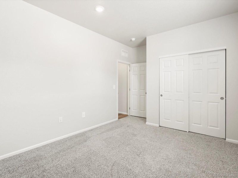 Spacious, unfurnished interior of a new home in Poudre Heights: The Alpine Collection, Windsor (Image 28).