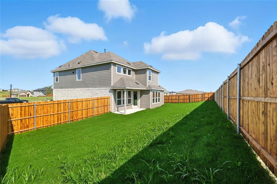 Exterior details and patio area of a home in Pebblebrook, Sherman (Image 3).