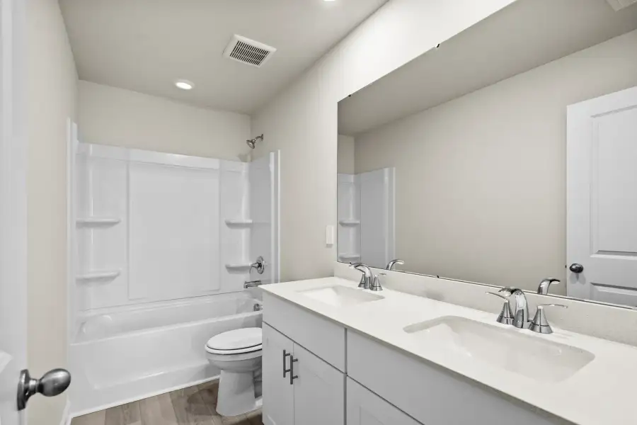 Furnished interior view inside a new home in Waterside - Boardwalk Series, Longs (Image 12). Furnished interior view inside a new home in Waterside - Boardwalk Series, Longs (Image 12).
