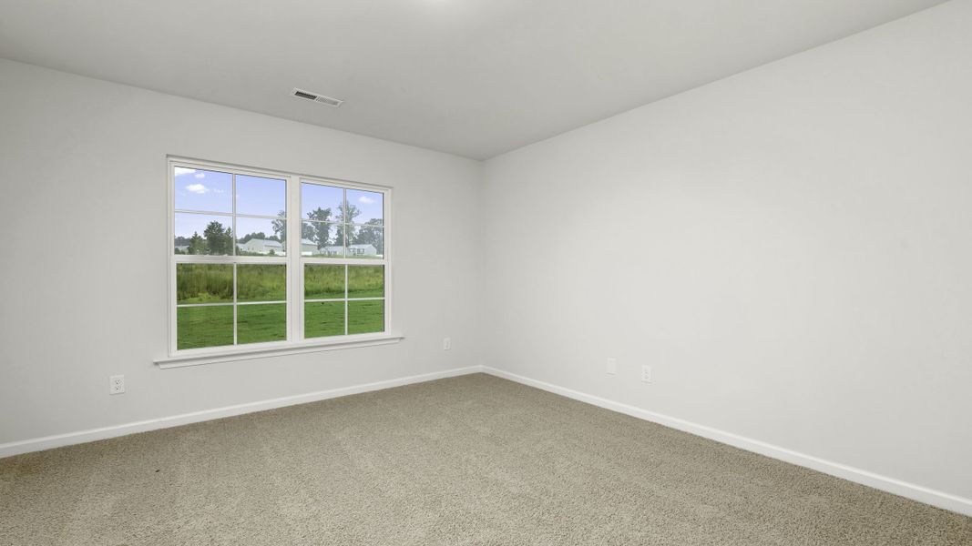 Representative unfurnished interior of a home built from the Manning by D.R. Horton in Chandler Pointe, Rural Hall (Image 13).