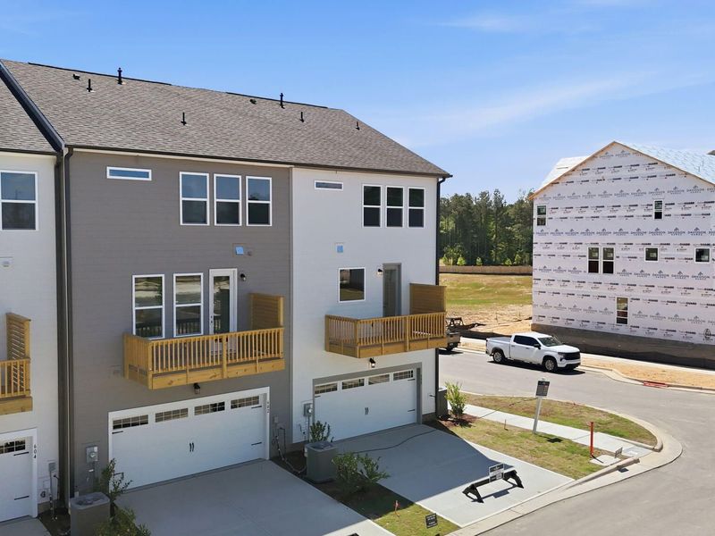 Exterior details and patio area of a home in Forestville Yard Townhomes, Knightdale (Image 4). Exterior details and patio area of a home in Forestville Yard Townhomes, Knightdale (Image 4).
