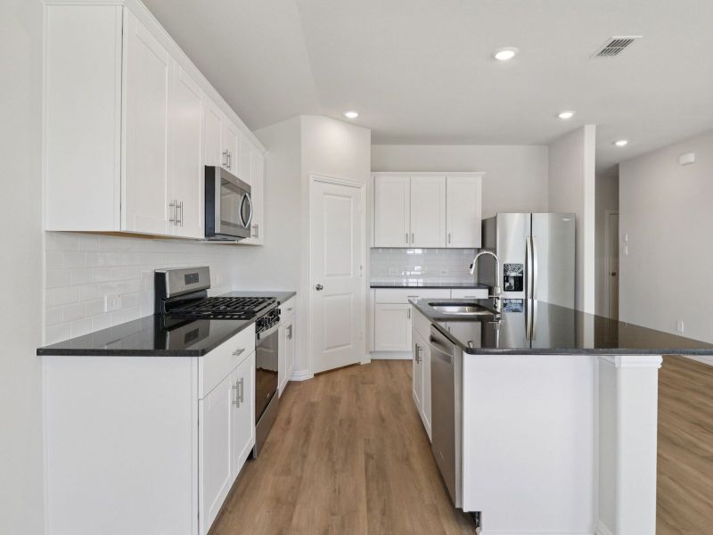 Furnished interior view inside a new home in River Ridge, Crandall (Image 7).