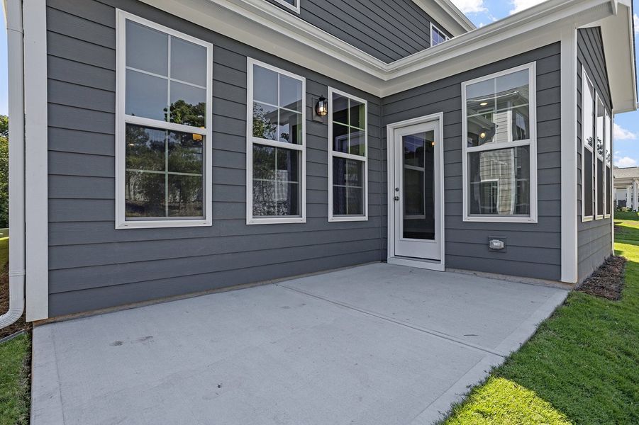 Front exterior of a new home in Georgias Landing, Raleigh, NC, highlighting curb appeal (Image 25).