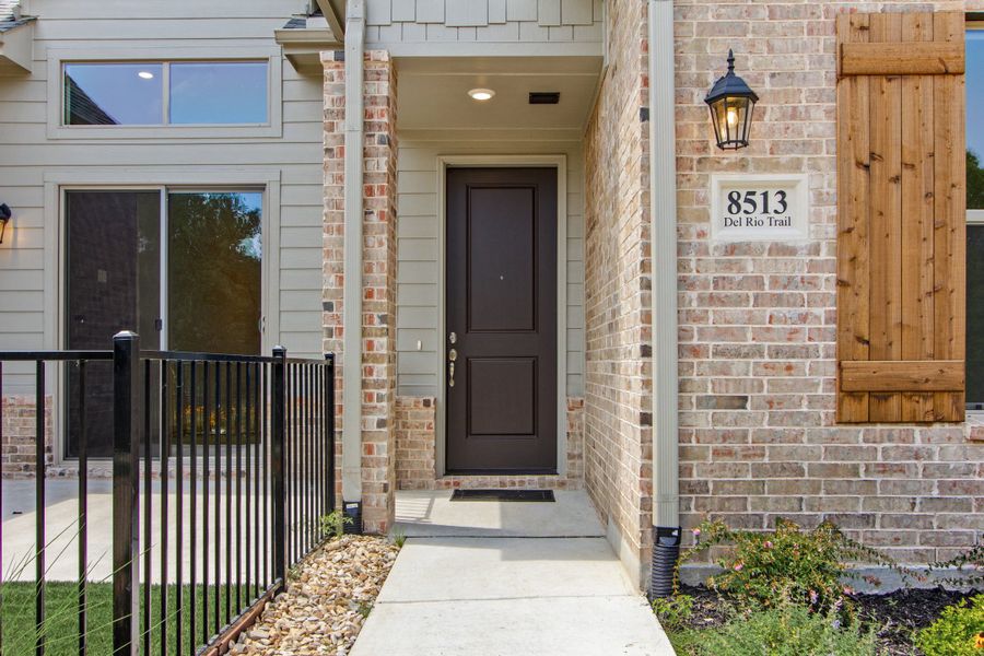 Exterior details and patio area of a home in Cottonwood Creek, Rowlett (Image 3).