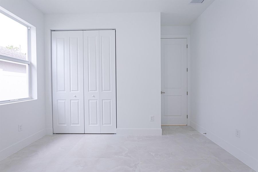 Spacious, unfurnished interior of a new home in , Jupiter (Image 11).