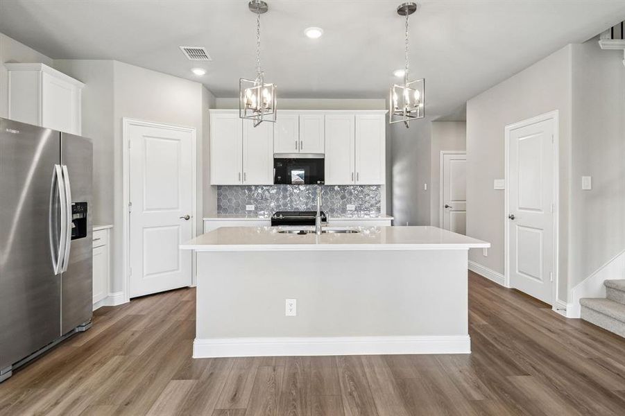 Photo is not of the actual home, but is an inspirational photo of builder’s model home and may depict options, furnishings, and/or decorator features that are not included.