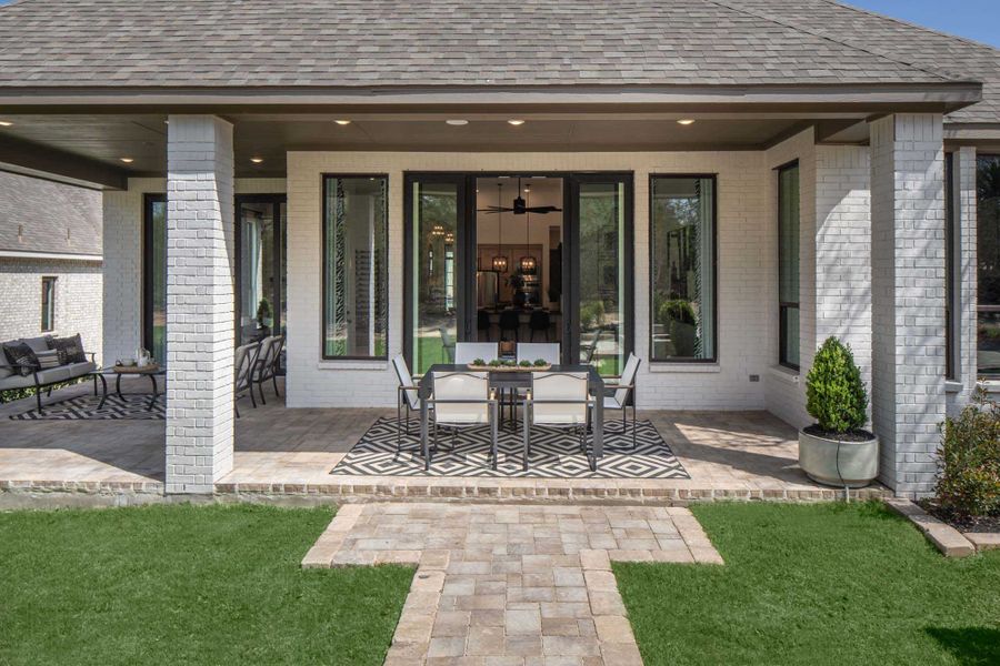 Representative exterior details of a home built from the 216G by Highland Homes in Quail Hollow, Rockwall (Image 24).