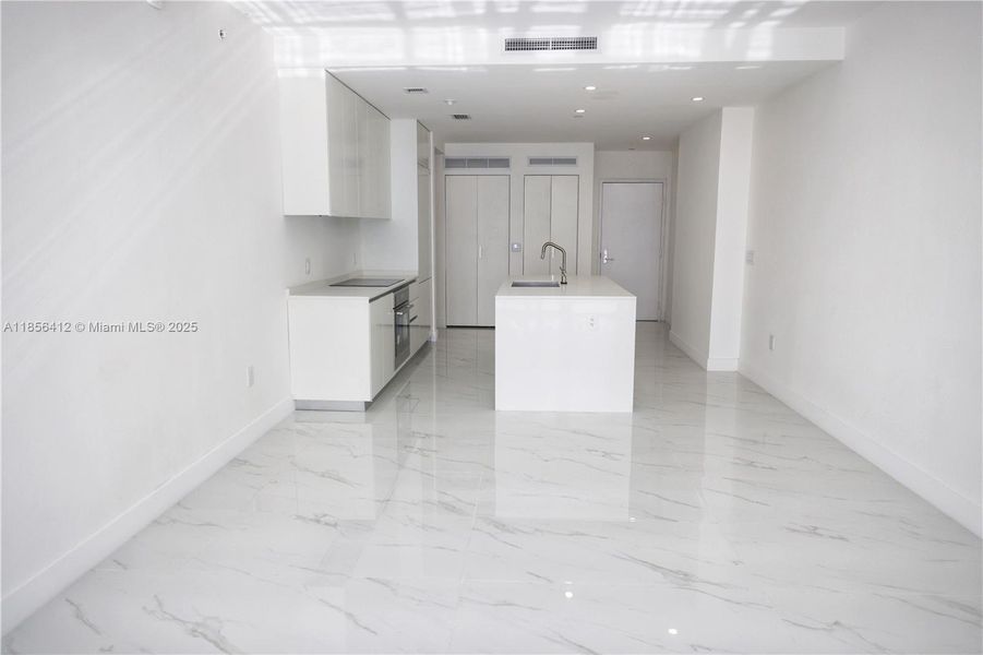 Spacious, unfurnished interior of a new home in Aria Reserve, Miami (Image 11). Spacious, unfurnished interior of a new home in Aria Reserve, Miami (Image 11).