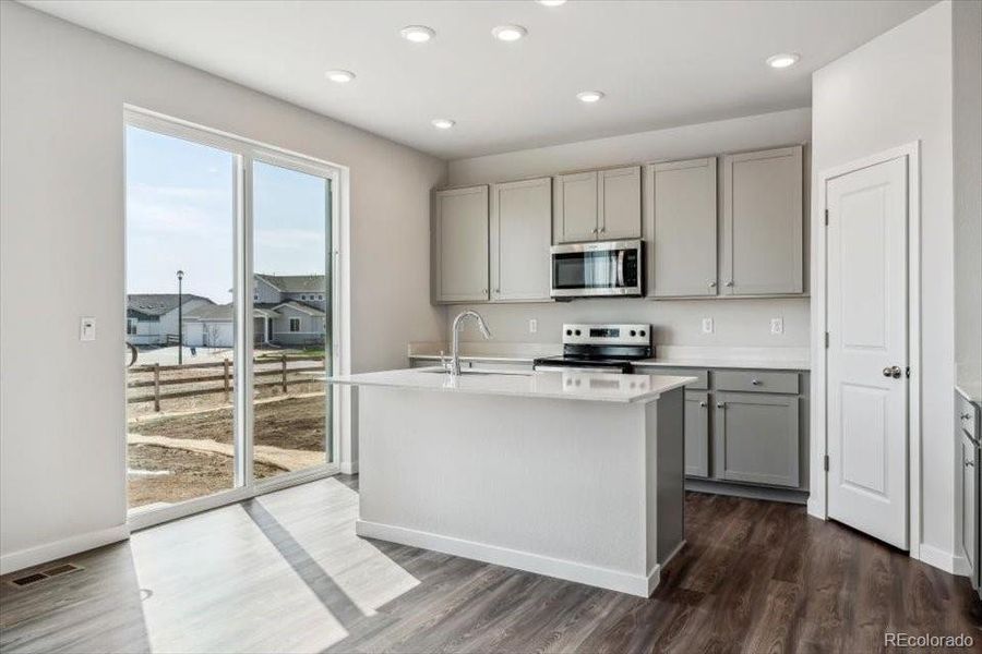 Furnished interior view inside a new home in Red Barn Meadows, Mead (Image 9).