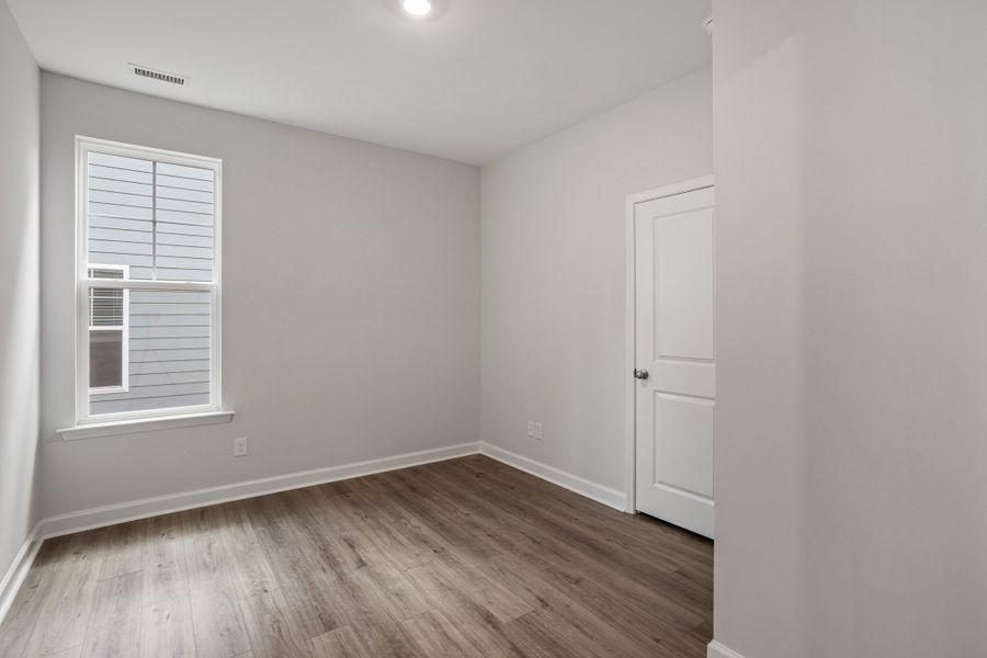 Spacious, unfurnished interior of a new home in Sweetbrier, Durham (Image 17).