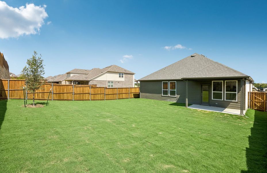 Exterior details and patio area of a home in Pinnacle at Legacy Hills, Celina (Image 3). Exterior details and patio area of a home in Pinnacle at Legacy Hills, Celina (Image 3).