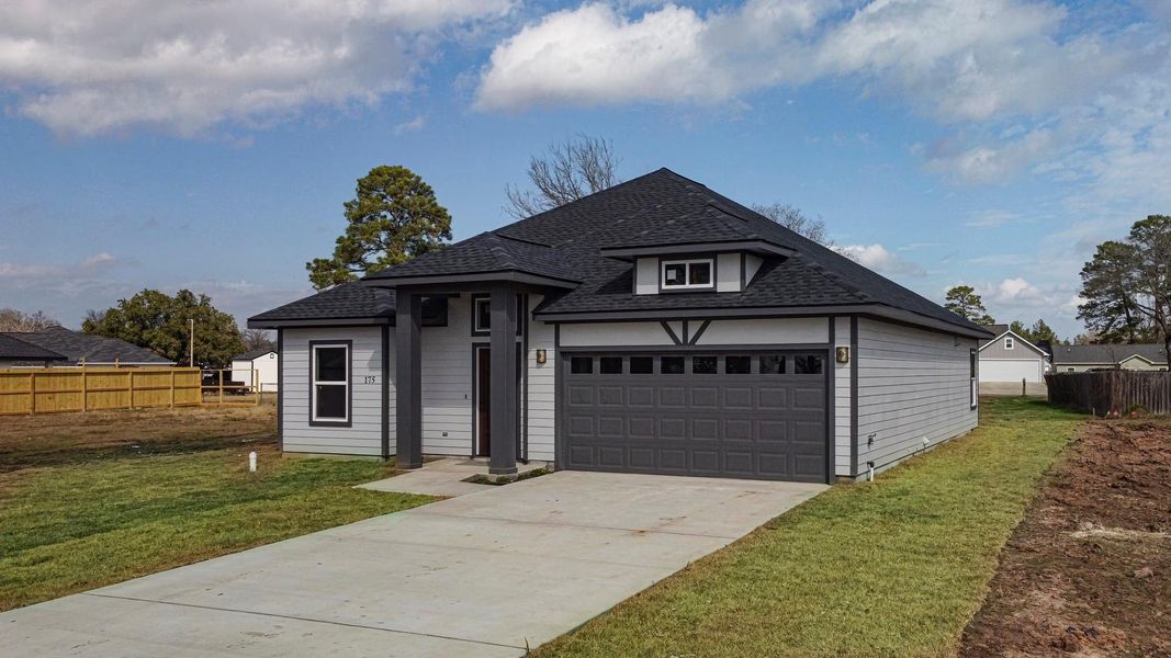 Front exterior of a new home in , Livingston, TX, highlighting curb appeal (Image 26). Front exterior of a new home in , Livingston, TX, highlighting curb appeal (Image 26).