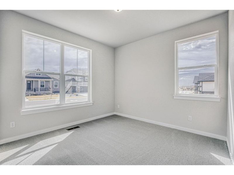 Spacious, unfurnished interior of a new home in RainDance, Windsor (Image 25).