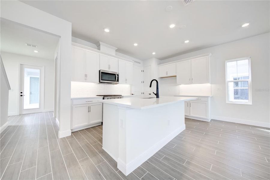Furnished interior view inside a new home in Bungalow Walk at Lakewood Ranch, Lakewood Ranch (Image 11).