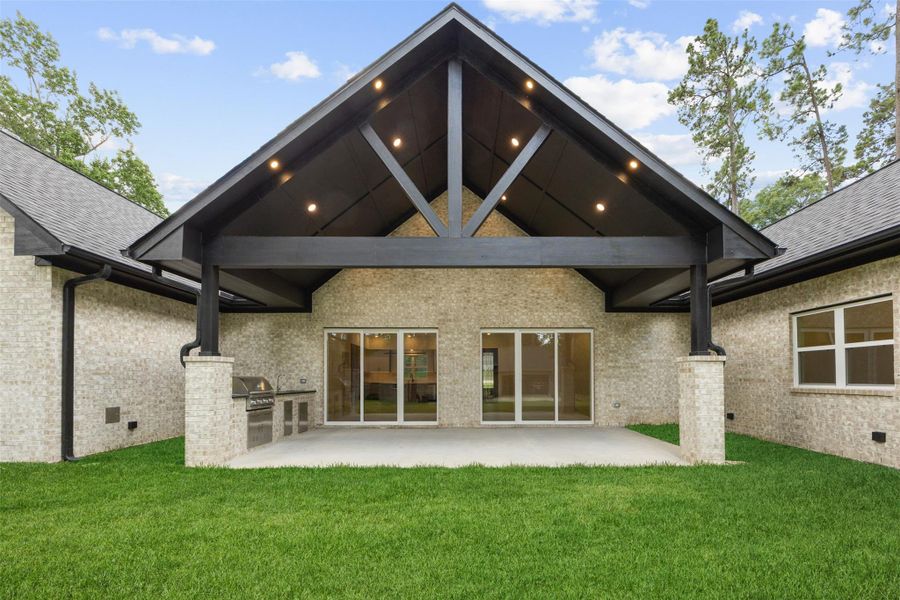 Vaulted covered patio designed for year-round outdoor entertaining.