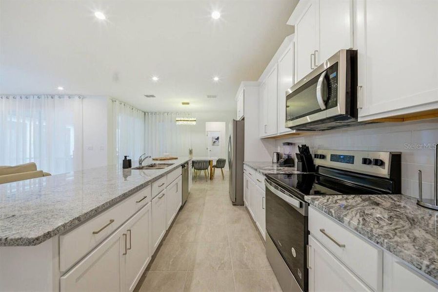 Furnished interior view inside a new home in Solara Resort, Kissimmee (Image 12).