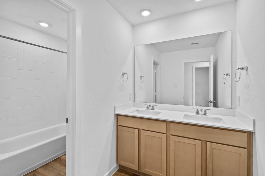 Furnished interior view inside a new home in Grand West, Houston (Image 8).