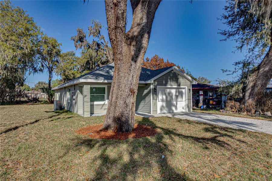 Front exterior of a new home in , Bartow, FL, highlighting curb appeal (Image 18).