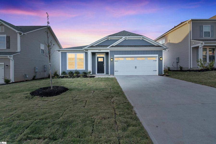 Front exterior of a new home in Halton Oaks, Spartanburg, SC, highlighting curb appeal (Image 17). Front exterior of a new home in Halton Oaks, Spartanburg, SC, highlighting curb appeal (Image 17).