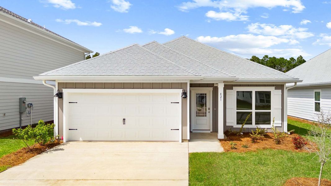 Front exterior of a new home in Bayside at Ward Creek, Panama City Beach, FL, highlighting curb appeal (Image 1). Front exterior of a new home in Bayside at Ward Creek, Panama City Beach, FL, highlighting curb appeal (Image 1).