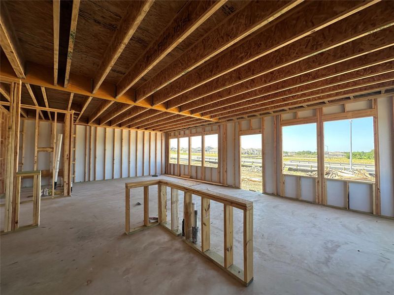 Framed walls and ceiling joists await finishing touches in this new construction. Framed walls and ceiling joists await finishing touches in this new construction.