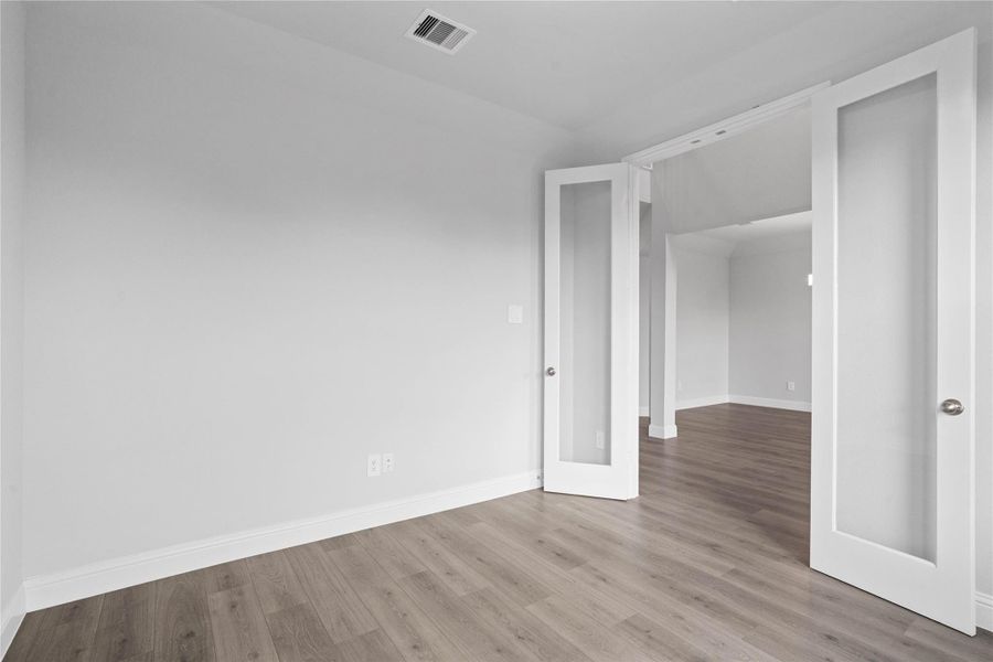 Additional view from the study into the hallway - highlighting the double French doors.
